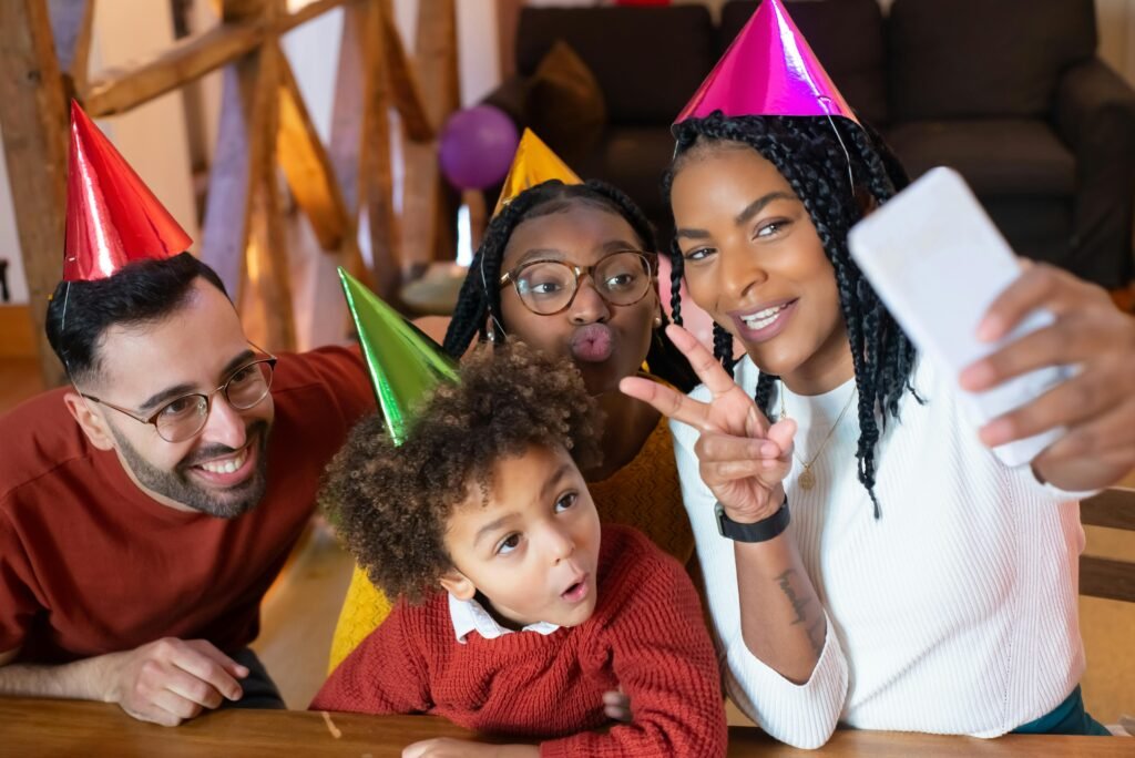 family with birthday hats